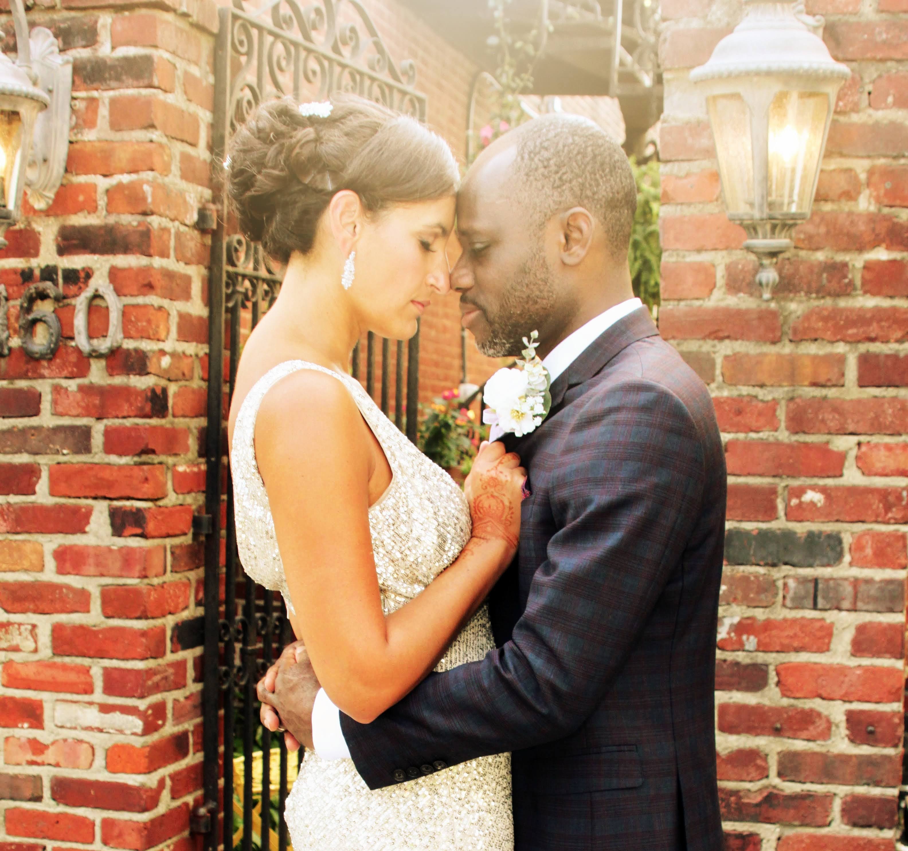 Couple exchanging vows at an intimate outdoor ceremony